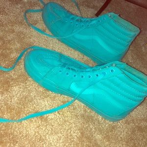 Turquoise high top vans